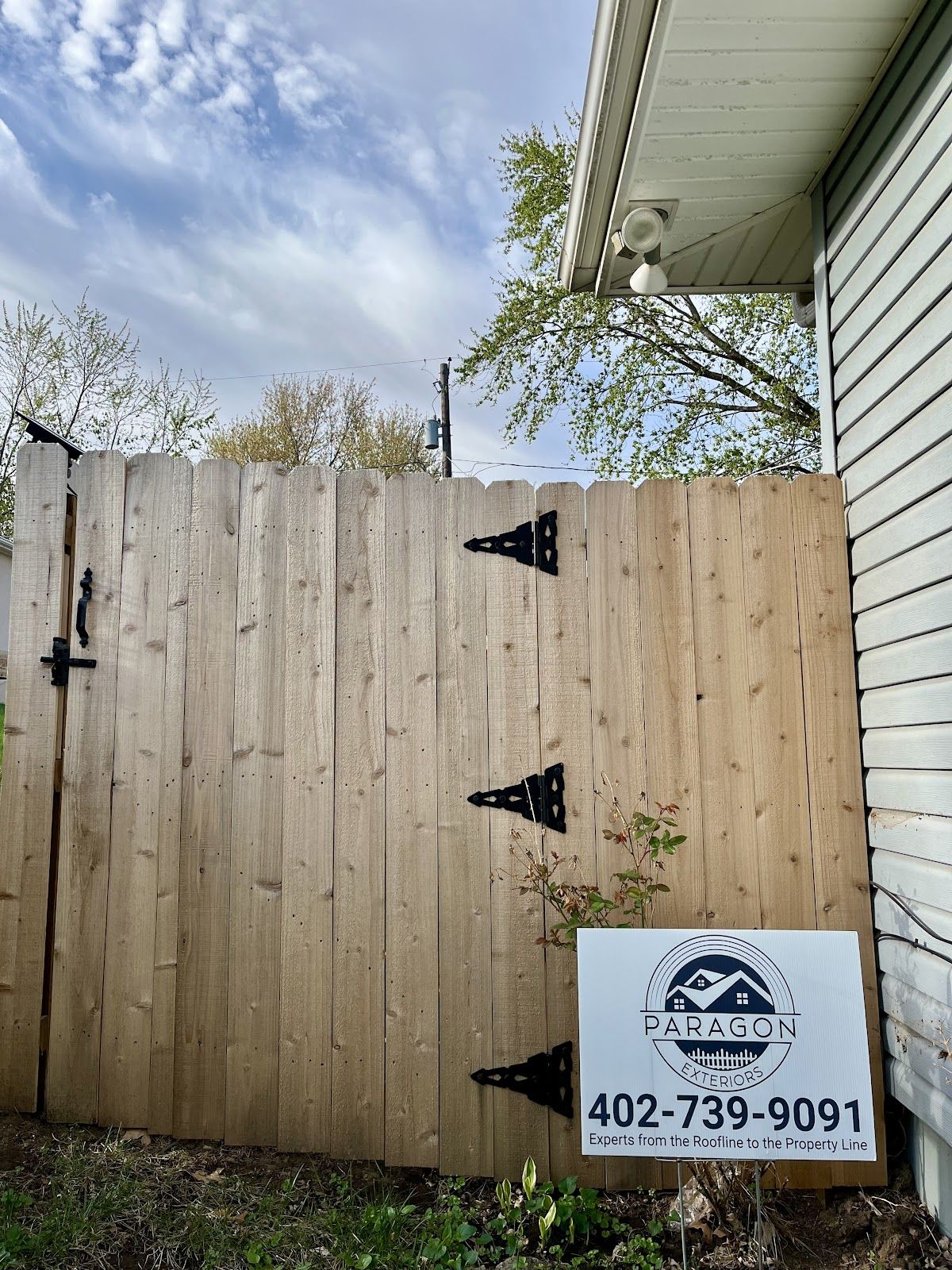 Cedar privacy fence with a matched gate